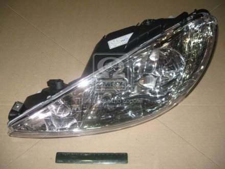 Фара лів. PEUGEOT 206 TYC 206156052B
