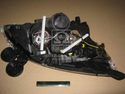 Фара лів. OP VECTRA C 06- TYC 20B042A52B