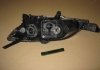 Фара пра. MAZDA 3 HB 04- TYC 20A859052B (фото 1)