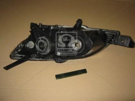 Фара пра. MAZDA 3 HB 04- TYC 20A859052B